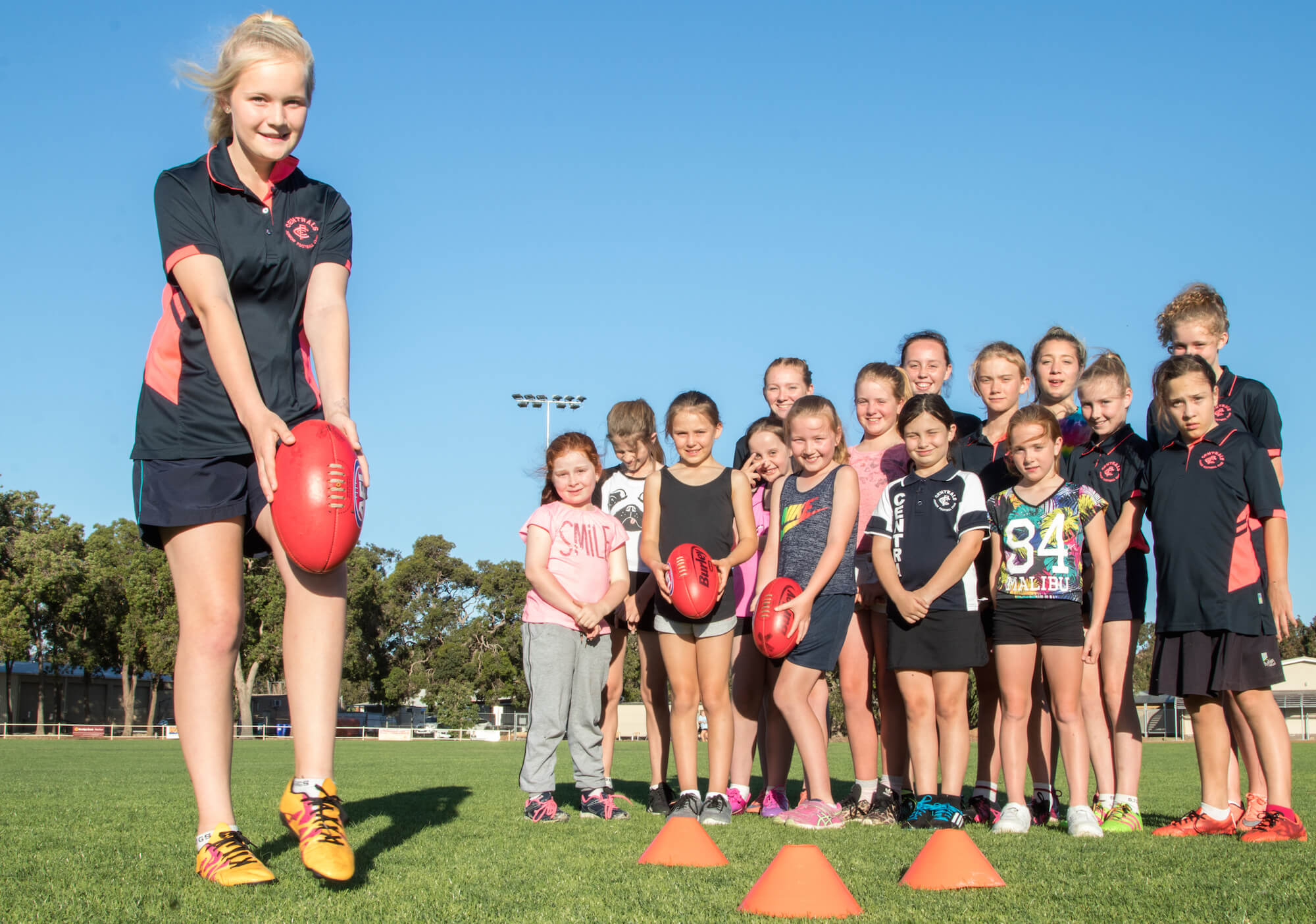 Girls kicking goals
