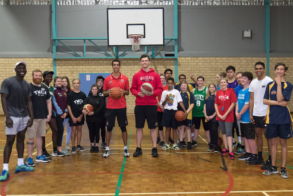 Sports pros help out youth