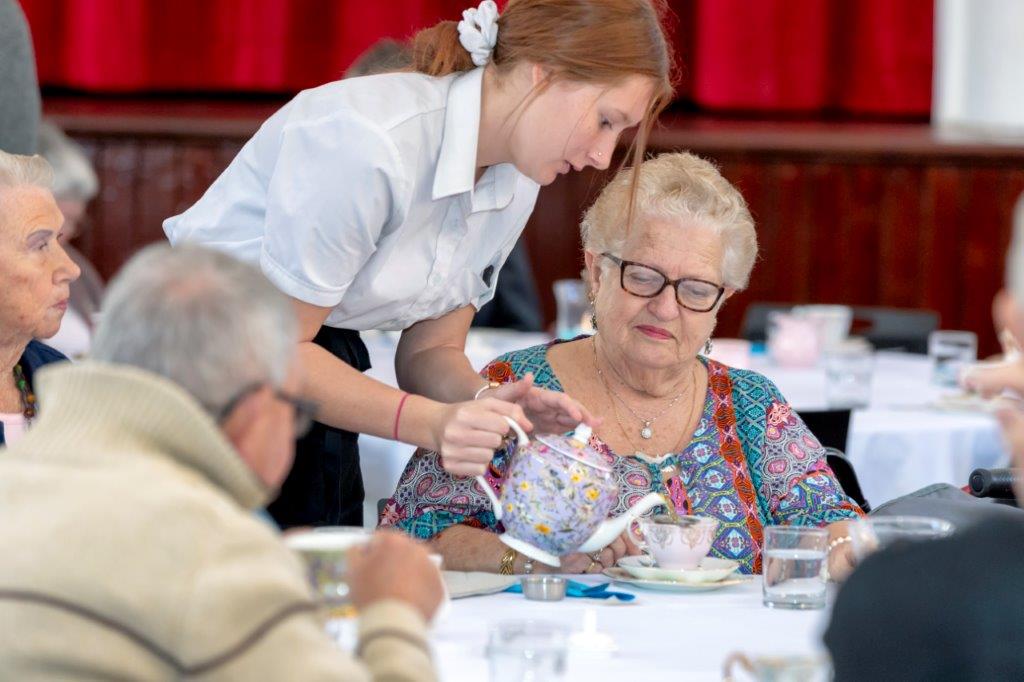 Students pour it on for seniors