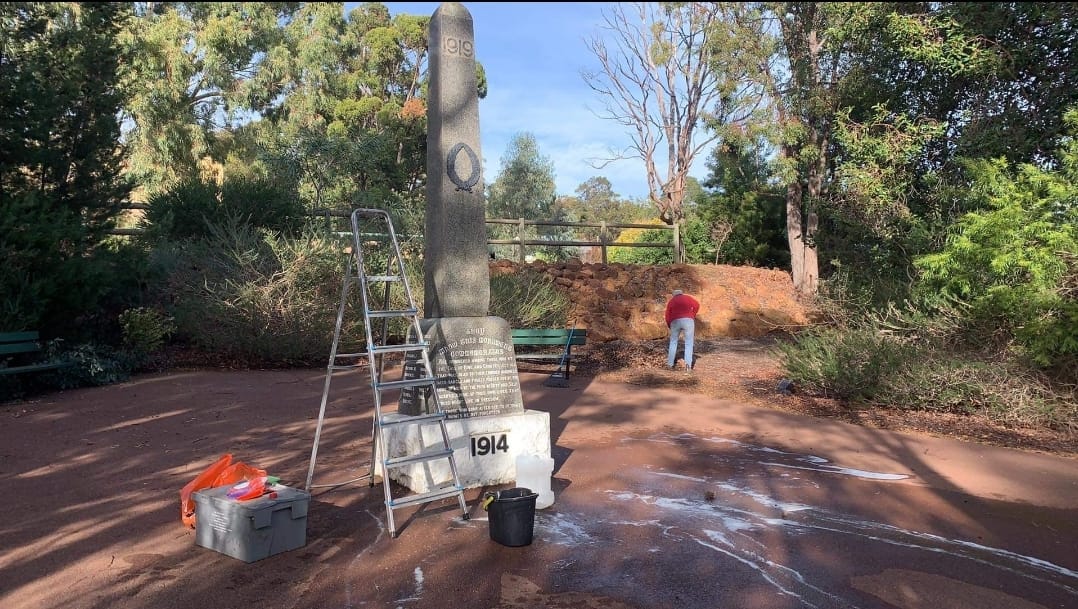 Volunteers clean up historical landmarks
